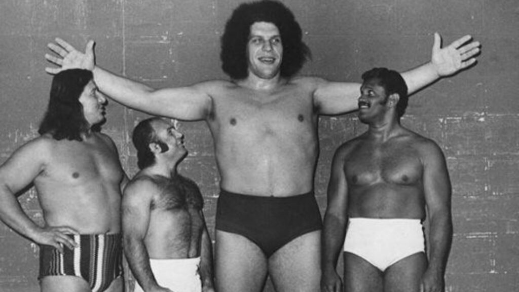 André the Giant with three other wrestlers